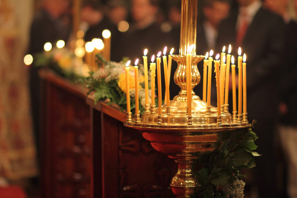 Lit,Beeswax,Candles,In,Candle,Stand